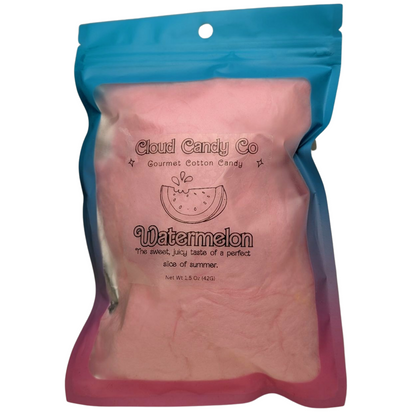 Pink cotton candy in a blue packaging with 'Cloud Candy Co' branding on a white background