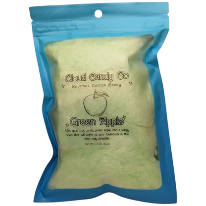 Green cotton candy in a blue Cloud Candy Co packaging on a white background